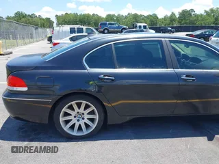 2005 BMW 7 Series 745Li with VIN WBAGN63545DS59212, listed as a IAAI auction lot 42510606 with 124,395 mi miles and . Bid and sale history available at DreamBid. Image 19.