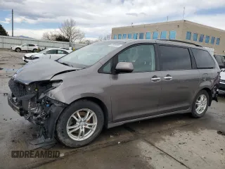 2014 Toyota Sienna SE with VIN 5TDXK3DC1ES445110, listed as a Copart auction lot 49928895 with 127,087 mi miles and Salvage Title. Bid and sale history available at DreamBid. Image 1.