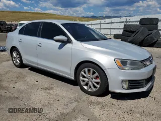 2012 Volkswagen Jetta PZEV with VIN 3VW4A7AJXCM123009, listed as a Copart auction lot 63573145 with 242,860 mi miles and Clean title. Bid and sale history available at DreamBid. Image 4.