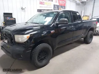 2013 Toyota Tundra 4WD Truck with VIN 5TFUW5F17DX305344, listed as a IAAI auction lot 41310441 with 291,061 mi miles. Bid and sale history available at carsss.com. Image 2.