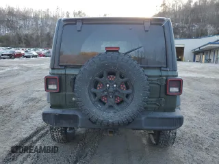 2021 Jeep Wrangler Unlimited Willys Sport with VIN 1C4HJXDG1MW737422, listed as a Copart auction lot 42213845 with 77,363 mi miles and Salvage title. Bid and sale history available at DreamBid. Image 6.