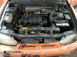 1997 Hyundai Accent z VIN KMHVD14NXVU221266, wystawiony jako Copart lot #86383044 z przebiegiem 159 517 mil mil oraz Szkody całkowita. Historia ofert i sprzedaży dostępna na DreamBid. Obrazek 11.