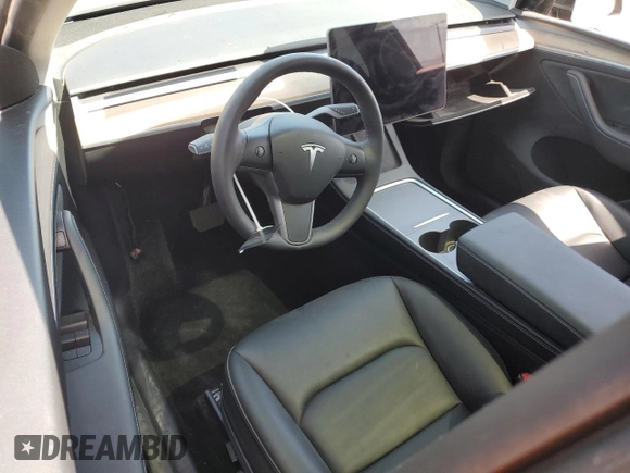 2024 Tesla Model Y Long Range with VIN 7SAYGDEEXRA237667, listed as a Copart auction lot 58260635 with Not provided miles and Salvage title. Bid and sale history available at DreamBid. Image 8.