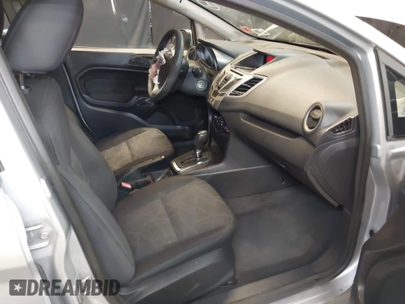 2012 Ford Fiesta SE with VIN 3FADP4BJ1CM110315, listed as a IAAI auction lot 39266357 with 144,749 mi miles. Bid and sale history available at carsss.com. Image 5.