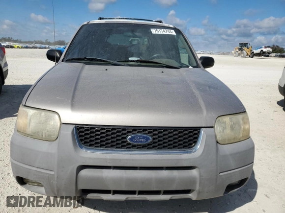 2001 Ford Escape XLT with VIN 1FMCU04101KF61126, listed as a Copart auction lot 76174744 with 0 mi miles and Salvage Title. Bid and sale history available at carsss.com. Image 5.