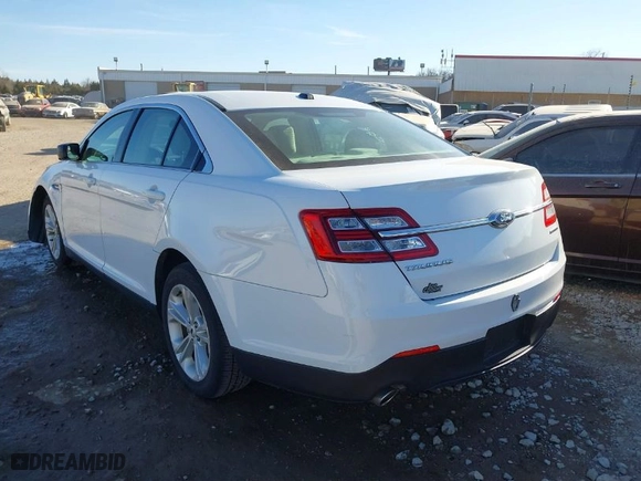 2018 Ford Taurus SE with VIN 1FAHP2D85JG127853, listed as a IAAI auction lot 41596548 with 128,087 mi miles. Bid and sale history available at carsss.com. Image 3.