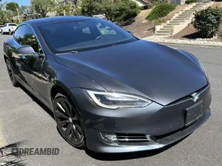 2017 Tesla Model S 100D with VIN 5YJSA1E26HF215014, listed as a IAAI auction lot 42254930 with 57,370 mi miles and . Bid and sale history available at DreamBid. Image 1.