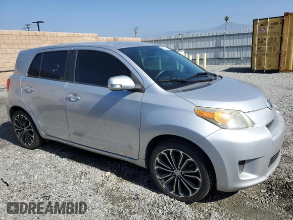 2010 Scion xD with VIN JTKKU4B40A1005613, listed as a Copart auction lot 56074605 with 205,505 mi miles and Clean Title. Bid and sale history available at DreamBid. Image 4.