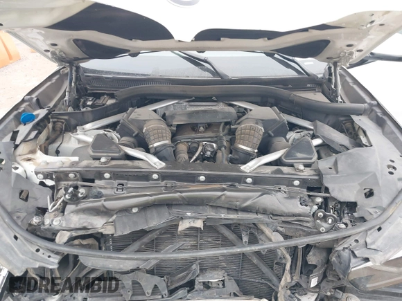 2021 BMW X6 M50i z VIN 5UXCY8C01M9E51506, wystawiony jako IAAI lot #41538726 z przebiegiem Nie podano mil oraz . Historia ofert i sprzedaży dostępna na DreamBid. Obrazek 10.