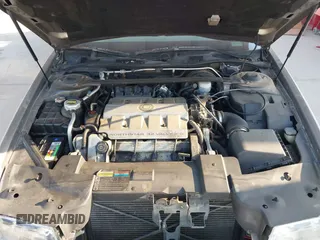 1997 Cadillac Eldorado ESC z VIN 1G6EL12YXVU619553, wystawiony jako IAAI lot #42324158 z przebiegiem 121 311 mil mil oraz . Historia ofert i sprzedaży dostępna na DreamBid. Obrazek 10.
