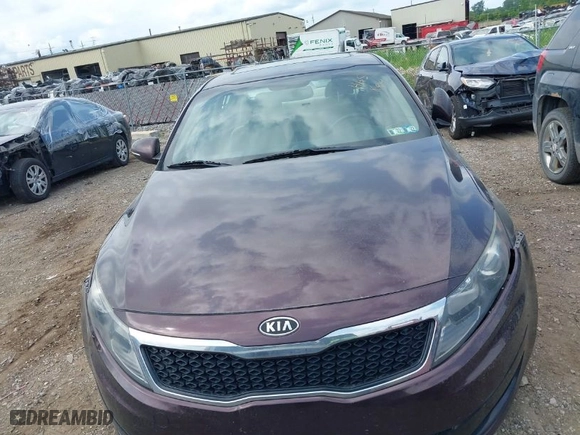 2011 Kia Optima LX with VIN KNAGM4A73B5063778, listed as a IAAI auction lot 39932051 with 143,175 mi miles. Bid and sale history available at carsss.com. Image 14.