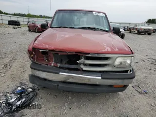 1997 Mazda B-Series 2WD Truck with VIN 4F4CR12A1VTM23469, listed as a Copart auction lot 63211114 with 148,272 mi miles and Salvage Title. Bid and sale history available at carsss.com. Image 5.