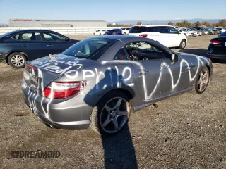 2013 Mercedes-Benz SLK-Class SLK 250 with VIN WDDPK4HA7DF058855, listed as a Copart auction lot 82673374 with 87,699 mi miles and Salvage Title. Bid and sale history available at carsss.com. Image 3.