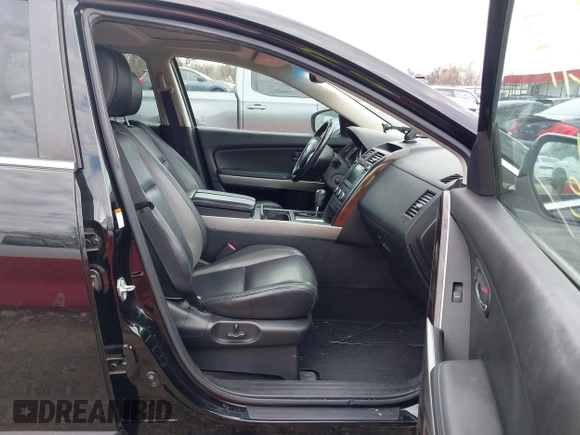 2012 Mazda CX-9 Grand Touring with VIN JM3TB3DV2C0335030, listed as a IAAI auction lot 41909217 with 126,714 mi miles. Bid and sale history available at carsss.com. Image 5.