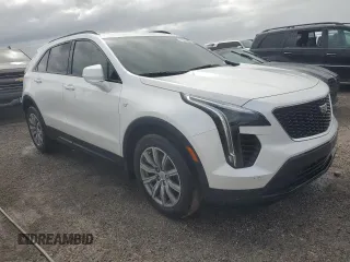 2022 Cadillac XT4 FWD Sport z VIN 1GYFZER44NF118862, wystawiony jako Copart lot #75053034 z przebiegiem 14 983 mil mil oraz Nie do naprawy • Non repairable. Historia ofert i sprzedaży dostępna na DreamBid. Obrazek 4.