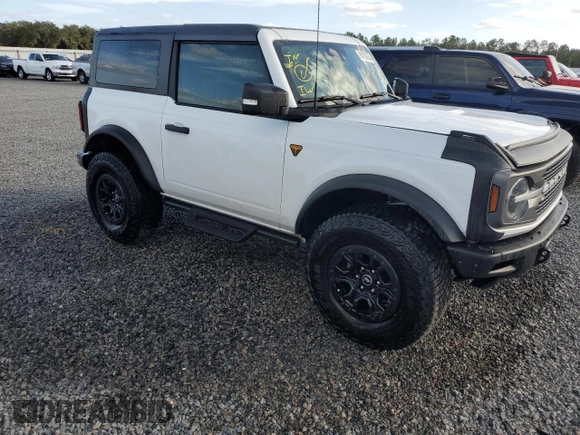 2023 Ford Bronco with VIN 1FMDE5CH4PLB68214, listed as a Copart auction lot 80103624 with 15,189 mi miles and Salvage Title. Bid and sale history available at carsss.com. Image 4.