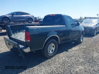 2002 Ford F-150 XL with VIN 1FTRF17W52KE24870, listed as a IAAI auction lot 42024831 with 319,578 mi miles and . Bid and sale history available at DreamBid. Image 4.