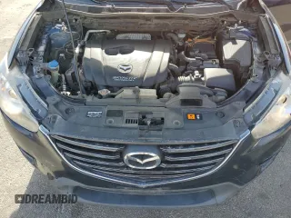2016 Mazda CX-5 Sport with VIN JM3KE2BY0G0730906, listed as a Copart auction lot 51611865 with 207,166 mi miles and Salvage Title. Bid and sale history available at carsss.com. Image 12.