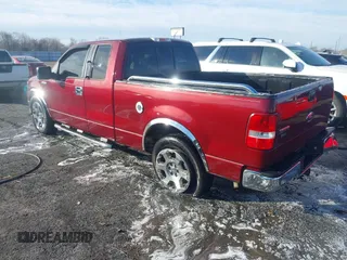 2005 Ford F-150 XLT with VIN 1FTPX12585NA02887, listed as a IAAI auction lot 41353228 with 162,863 mi miles. Bid and sale history available at carsss.com. Image 3.