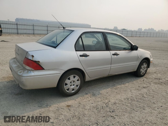 2002 Mitsubishi Lancer ES with VIN JA3AJ26E22U045919, listed as a Copart auction lot 63852225 with 184,071 mi miles and Salvage title. Bid and sale history available at DreamBid. Image 3.