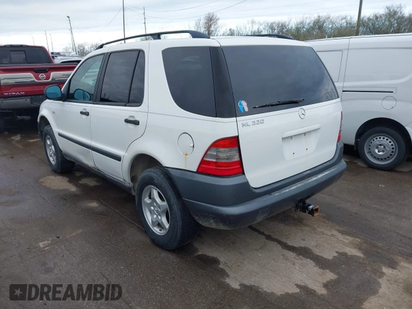 1999 Mercedes-Benz M 320/430/500 with VIN 4JGAB54E3XA141663, listed as a IAAI auction lot 41886982 with 196,503 mi miles and . Bid and sale history available at DreamBid. Image 3.