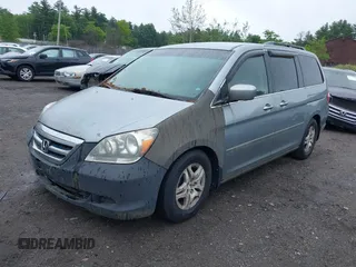 2006 Honda Odyssey EX with VIN 5FNRL38446B080677, listed as a IAAI auction lot 42458026 with 263,126 mi miles and . Bid and sale history available at DreamBid. Image 2.