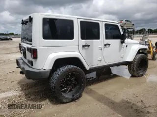 2015 Jeep Wrangler Unlimited Wrangler X with VIN 1C4BJWEG6FL614671, listed as a Copart auction lot 62286095 with 94,928 mi miles and Salvage title. Bid and sale history available at DreamBid. Image 3.