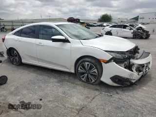 2016 Honda Civic EX-L с VIN 2HGFC1F74GH650713, выставлен на аукционе Copart как лот 58959515 с пробегом Не указан миль и Списание • Salvage title. История ставок и продаж доступна на DreamBid. Изображение 4.