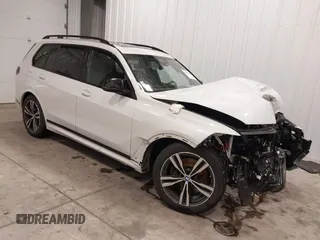 2024 BMW X7 M60i with VIN 5UX33EM05R9T46595, listed as a IAAI auction lot 40738482 with 12,807 mi miles. Bid and sale history available at carsss.com. Image 1.