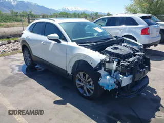 2024 Mazda CX-30 S Premium with VIN 3MVDMBDM8RM633580, listed as a IAAI auction lot 42152915 with 18,679 mi miles and . Bid and sale history available at DreamBid. Image 1.
