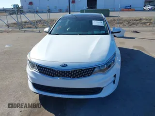 2016 Kia Optima EX with VIN 5XXGU4L32GG032974, listed as a IAAI auction lot 41881338 with 118,590 mi miles. Bid and sale history available at carsss.com. Image 13.