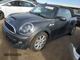 2011 MINI Convertible S with VIN WMWZP3C52BTX83901, listed as a Copart auction lot 84217174 with 82,831 mi miles and Salvage Title. Bid and sale history available at DreamBid. Image 1.