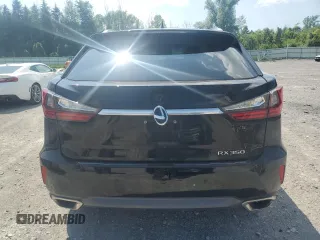 2016 Lexus RX 350 with VIN 2T2BZMCA9GC010001, listed as a Copart auction lot 66301085 with 116,091 mi miles and Salvage title. Bid and sale history available at DreamBid. Image 6.