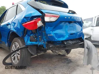 2021 Ford Escape SEL z VIN 1FMCU9H6XMUA63812, wystawiony jako IAAI lot #42418390 z przebiegiem 88 263 mil mil oraz . Historia ofert i sprzedaży dostępna na DreamBid. Obrazek 6.