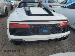 2020 Audi R8 Spyder performance z VIN WUA4BCFX3L7901606, wystawiony jako Copart lot #75199024 z przebiegiem Nie podano mil oraz Nie do naprawy. Historia ofert i sprzedaży dostępna na DreamBid. Obrazek 6.