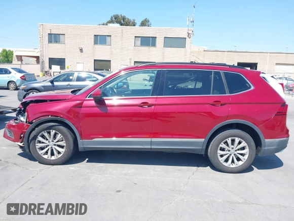 2018 Volkswagen Tiguan SEL z VIN 3VV3B7AX1JM214734, wystawiony jako IAAI lot #42473627 z przebiegiem 79 152 mil mil oraz . Historia ofert i sprzedaży dostępna na DreamBid. Obrazek 14.