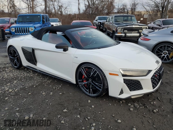 2020 Audi R8 Spyder performance z VIN WUA4BCFX3L7901606, wystawiony jako Copart lot #50161615 z przebiegiem 3 669 mil mil oraz Nie do naprawy • Non repairable. Historia ofert i sprzedaży dostępna na DreamBid. Obrazek 4.