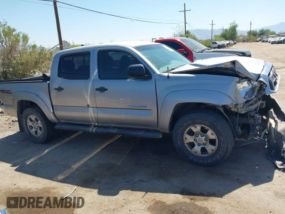 2015 Toyota Tacoma with VIN 3TMLU4EN6FM188736, listed as a IAAI auction lot 42605859 with 210,717 mi miles and . Bid and sale history available at DreamBid. Image 14.