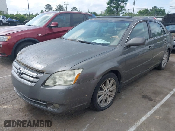 2006 Toyota Avalon XL with VIN 4T1BK36B86U093201, listed as a IAAI auction lot 42155033 with 264,958 mi miles. Bid and sale history available at carsss.com. Image 2.