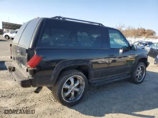 1996 Chevrolet Tahoe with VIN 3GNEK18R9TG128883, listed as a Copart auction lot 83367764 with 183,713 mi miles and Clean Title. Bid and sale history available at carsss.com. Image 3.