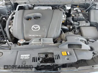 2020 Mazda CX-5 Touring with VIN JM3KFACM0L0804998, listed as a IAAI auction lot 41850998 with 44,519 mi miles. Bid and sale history available at carsss.com. Image 10.