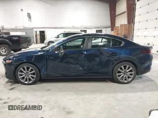 2021 Mazda 3 Select with VIN 3MZBPBBL3MM251893, listed as a IAAI auction lot 41854476 with 56,661 mi miles and . Bid and sale history available at DreamBid. Image 14.