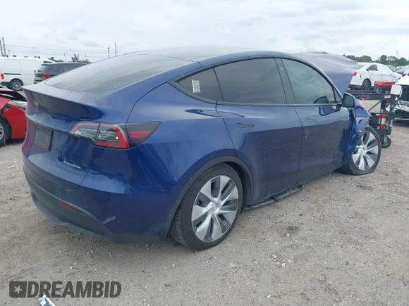 2022 Tesla Model Y Long Range z VIN 7SAYGDEE9NA002493, wystawiony jako IAAI lot #41756460 z przebiegiem 68 315 mil mil oraz . Historia ofert i sprzedaży dostępna na DreamBid. Obrazek 4.