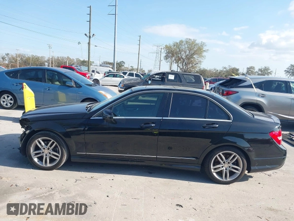 2014 Mercedes-Benz C-Class C 250 Sport with VIN WDDGF4HB3EG250671, listed as a IAAI auction lot 41607910 with 136,556 mi miles. Bid and sale history available at carsss.com. Image 15.