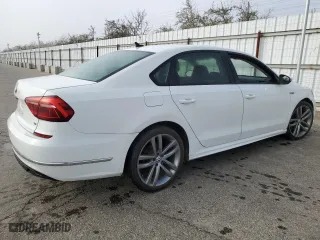 2018 Volkswagen Passat 2.0T S with VIN 1VWAA7A38JC030833, listed as a Copart auction lot 45661595 with 126,729 mi miles and Clean Title. Bid and sale history available at carsss.com. Image 3.