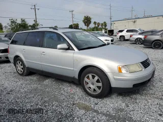 2000 Volkswagen Passat z VIN WVWNA23B6YE238932, wystawiony jako Copart lot #59837575 z przebiegiem 151 157 mil mil oraz Szkoda całkowita • Salvage title. Historia ofert i sprzedaży dostępna na DreamBid. Obrazek 4.