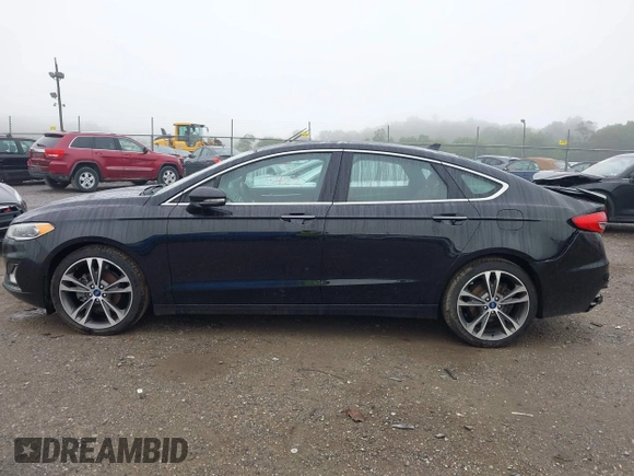 2019 Ford Fusion Titanium with VIN 3FA6P0D92KR125864, listed as a IAAI auction lot 42425422 with 109,340 mi miles and . Bid and sale history available at DreamBid. Image 14.