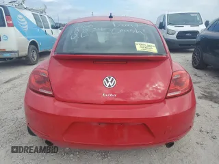 2012 Volkswagen Beetle 2.0T Turbo w/Sun/Sound with VIN 3VWV67ATXCM651866, listed as a Copart auction lot 43918205 with 94,896 mi miles and Salvage Title. Bid and sale history available at carsss.com. Image 7.