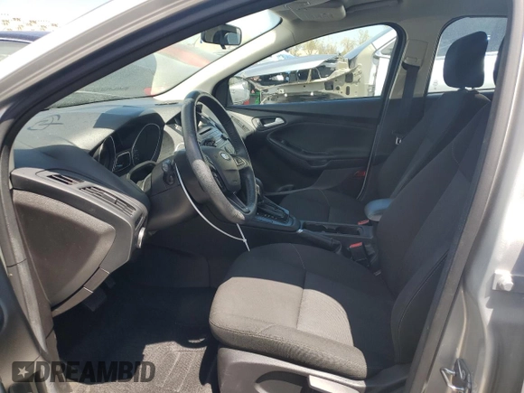 2017 Ford Focus SE with VIN 1FADP3F2XHL277097, listed as a Copart auction lot 53209825 with 100,384 mi miles and Salvage Title. Bid and sale history available at carsss.com. Image 7.