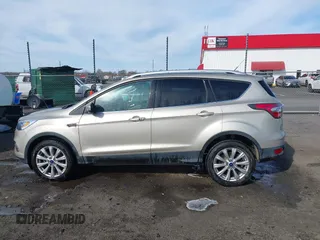 2017 Ford Escape Titanium with VIN 1FMCU0JD3HUB19602, listed as a IAAI auction lot 41816296 with 70,311 mi miles. Bid and sale history available at carsss.com. Image 14.
